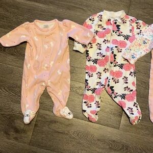 Four one piece baby girl jumpers